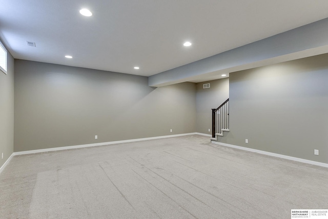 basement with light colored carpet