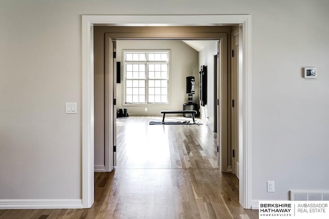 hallway featuring light wood-type flooring