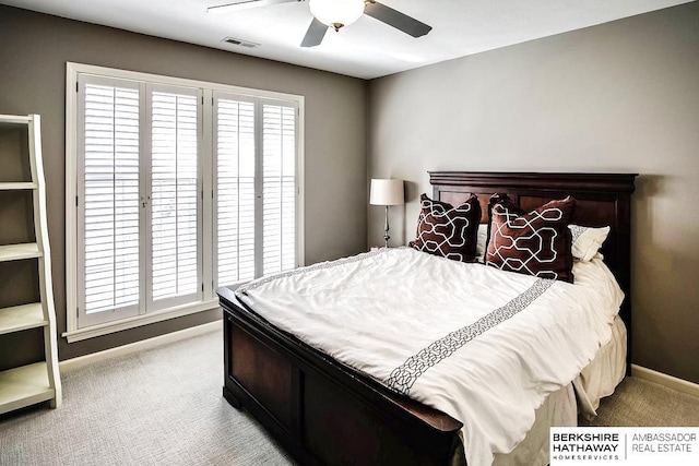 carpeted bedroom with ceiling fan