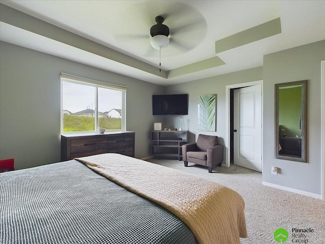 bedroom featuring light carpet and ceiling fan