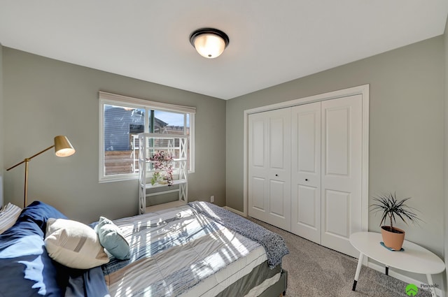 bedroom featuring a closet and carpet flooring