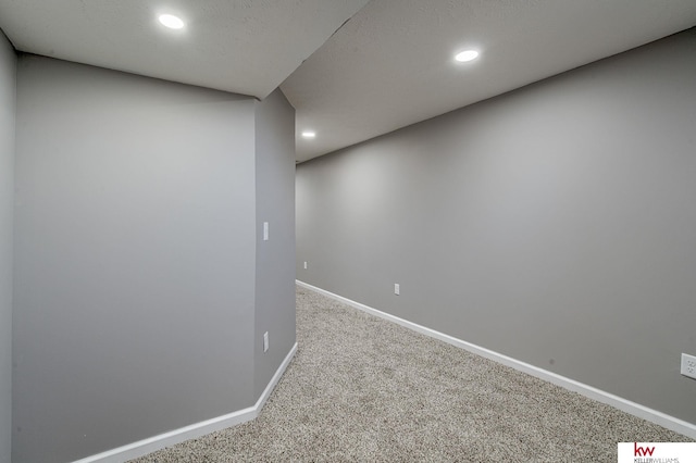 basement featuring carpet floors