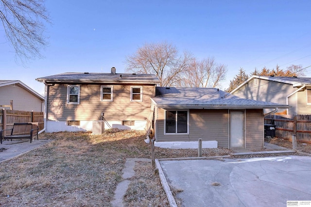 rear view of property with a patio