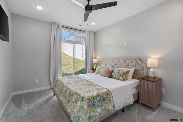 bedroom with access to outside, ceiling fan, and carpet flooring