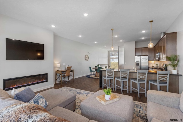 living room featuring dark hardwood / wood-style floors