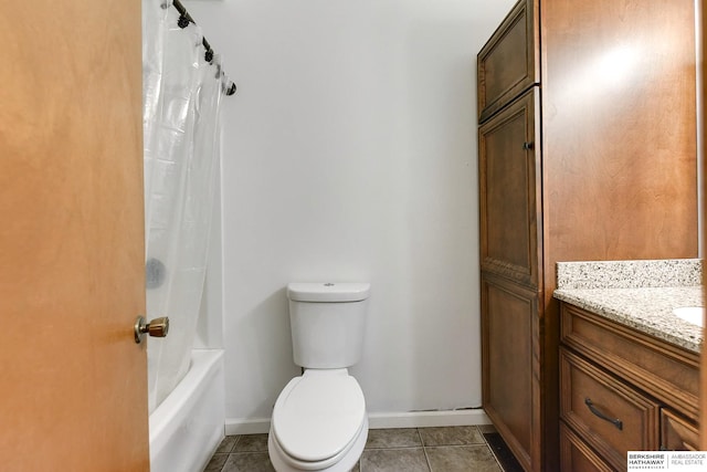 full bathroom with tile patterned floors, vanity, shower / tub combo, and toilet