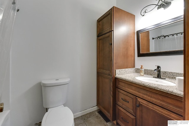 bathroom with tile patterned floors, vanity, curtained shower, and toilet