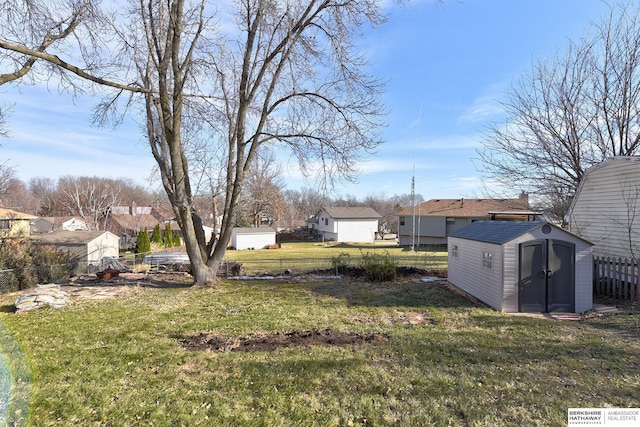 view of yard featuring a storage shed