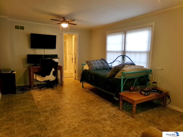 bedroom with ceiling fan and ornamental molding