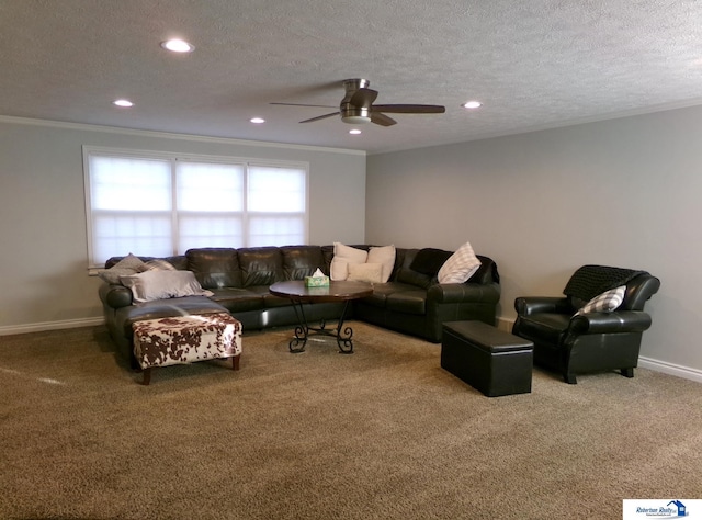 carpeted living room with a textured ceiling, ceiling fan, and crown molding