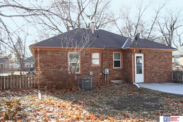 back of property featuring a patio area and central air condition unit