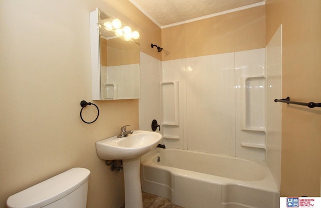 bathroom with crown molding, shower / bathtub combination, toilet, and a textured ceiling