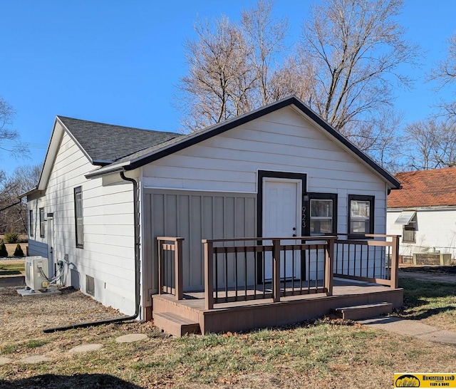 view of front of property with ac unit