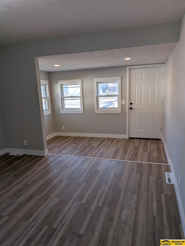 entrance foyer with dark wood-type flooring