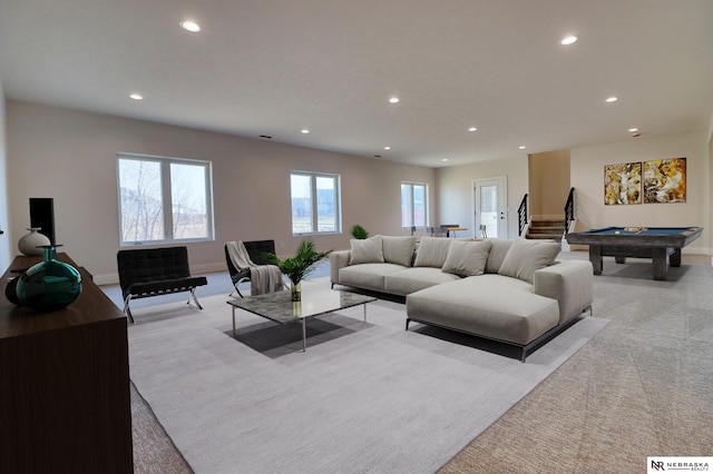 living room featuring light carpet and billiards