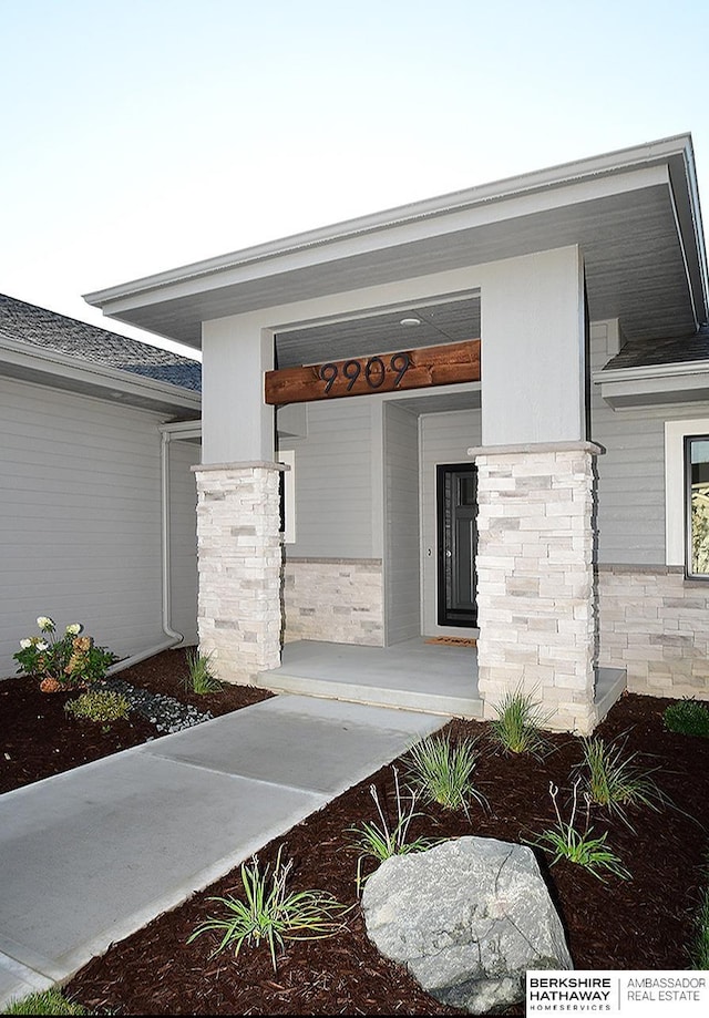 doorway to property featuring a porch