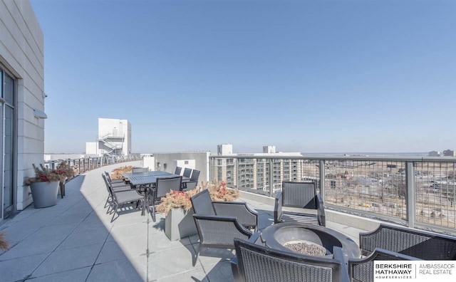 view of patio featuring a fire pit