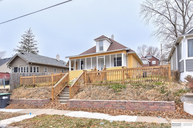 view of front of property featuring covered porch