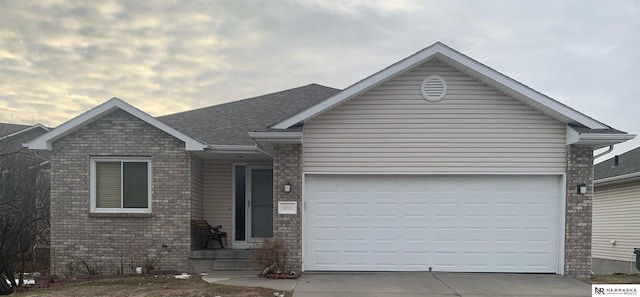 single story home featuring a garage