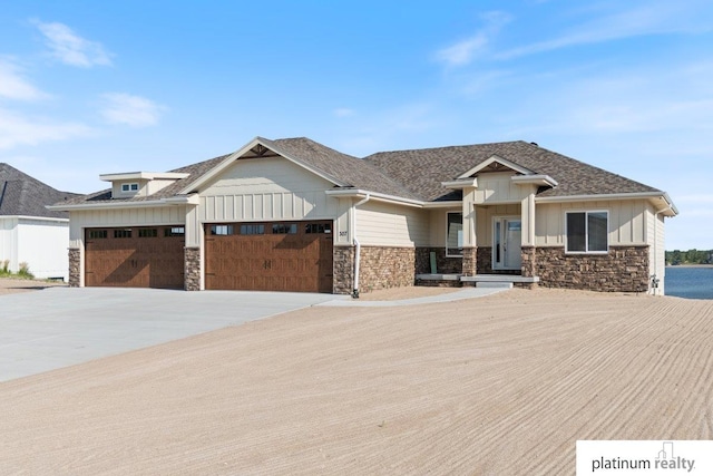 craftsman-style home with a garage