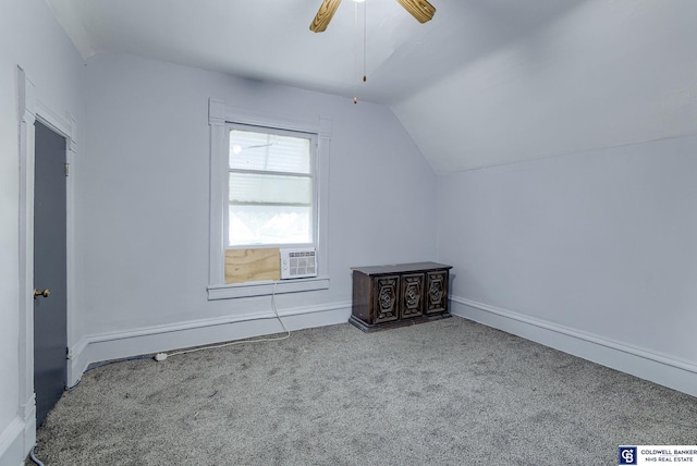 additional living space with carpet flooring, ceiling fan, and lofted ceiling