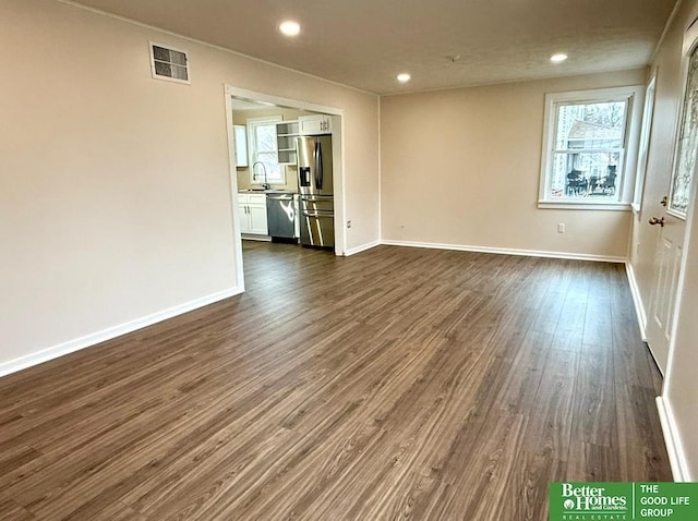 interior space featuring sink and dark hardwood / wood-style floors