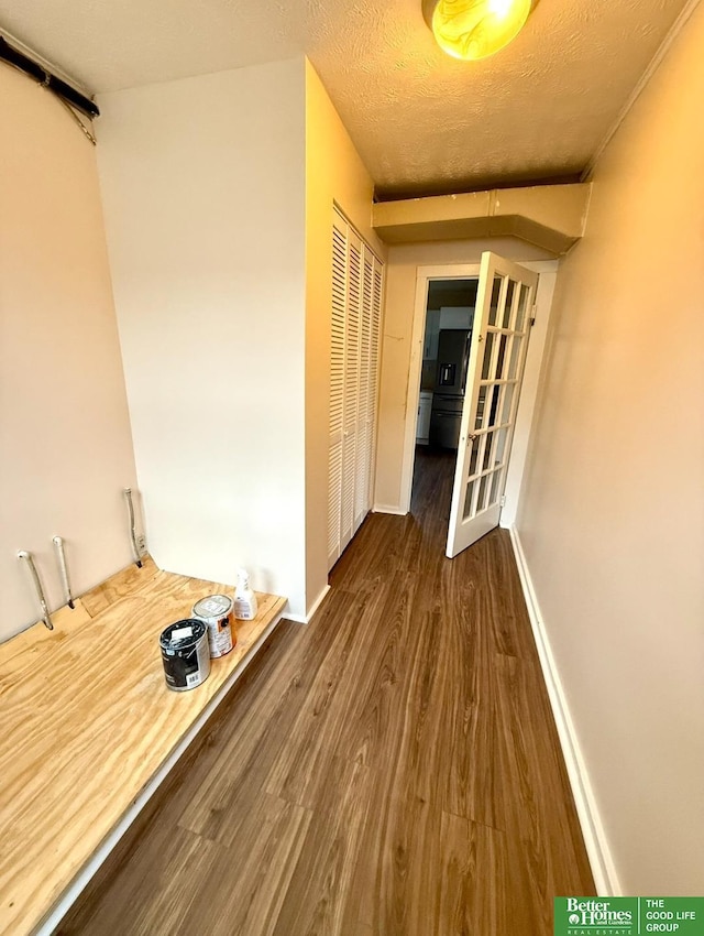 hallway featuring dark wood-type flooring