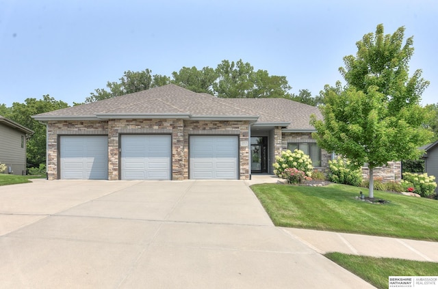 prairie-style house featuring a front lawn