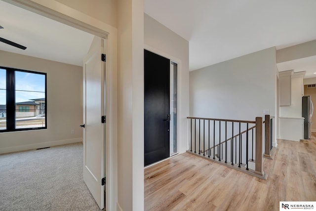 hall featuring light hardwood / wood-style flooring