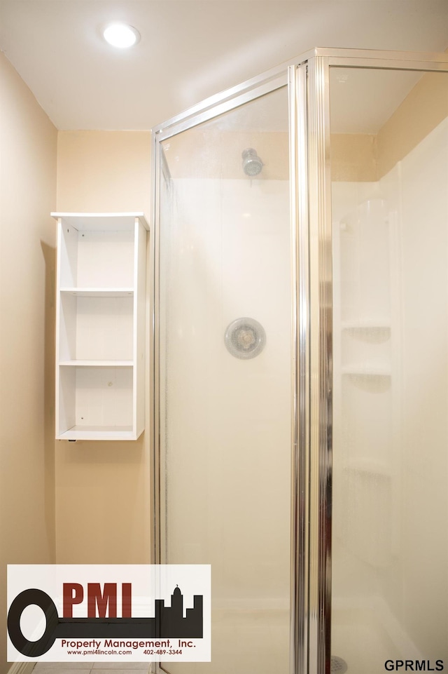 bathroom with an enclosed shower