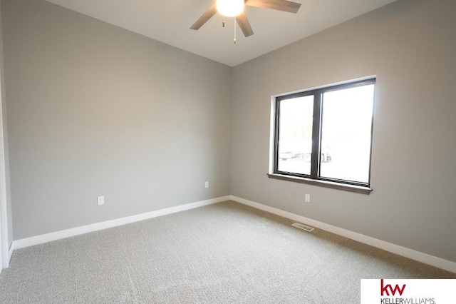 1450 Montana St, Superior, NE 68978 - carpeted empty room featuring a ceiling fan and baseboards