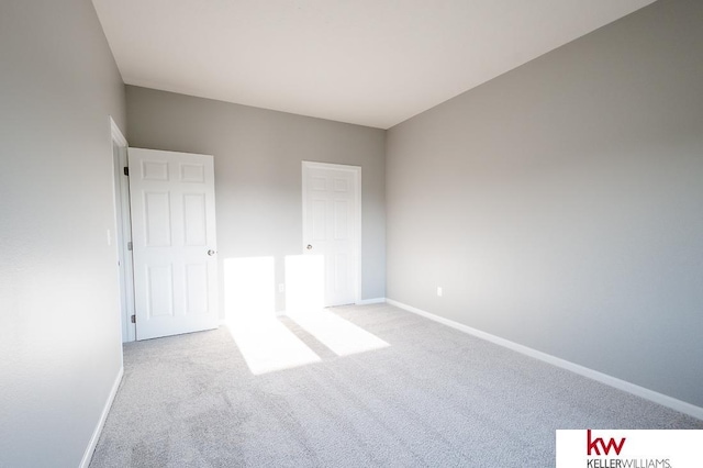1450 Montana St, Superior, NE 68978 - unfurnished bedroom with carpet flooring and baseboards