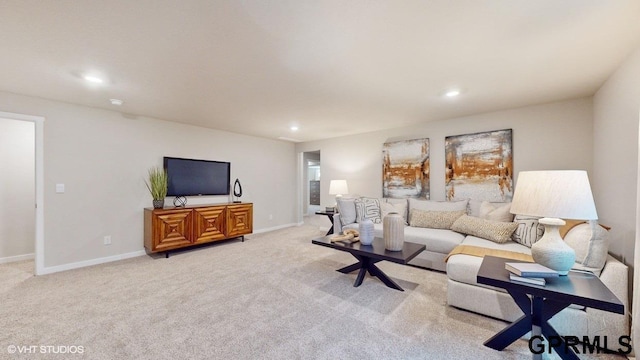 living room featuring light colored carpet