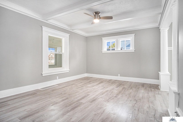 unfurnished room with beam ceiling, light hardwood / wood-style flooring, crown molding, and decorative columns