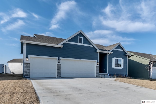 view of front of home with a garage