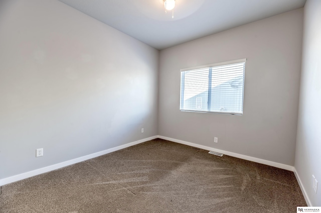 view of carpeted spare room