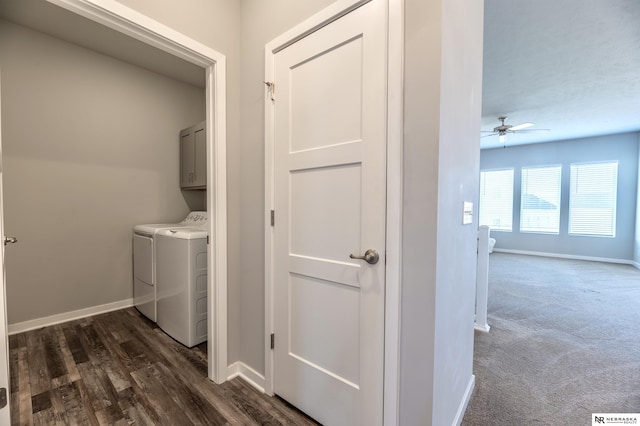 washroom with cabinets, ceiling fan, dark colored carpet, and washing machine and clothes dryer