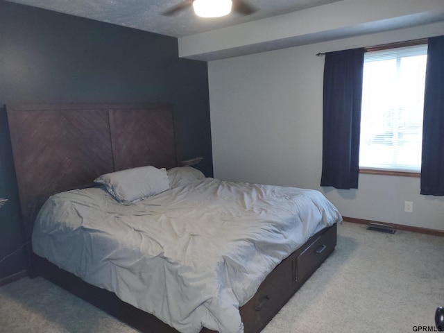 bedroom featuring carpet flooring and ceiling fan