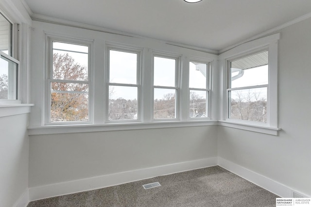 unfurnished sunroom featuring a healthy amount of sunlight