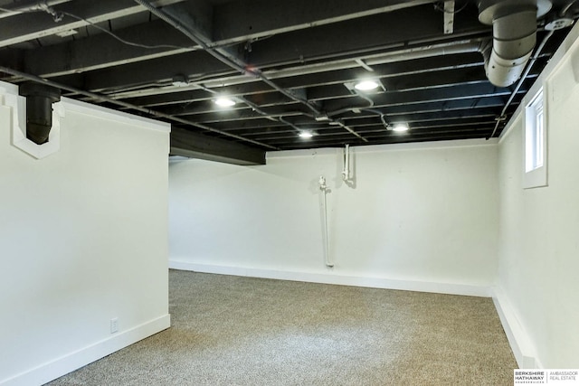 basement featuring carpet flooring