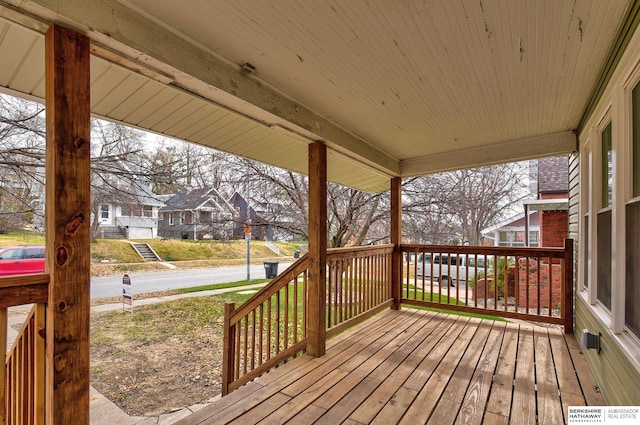 deck featuring covered porch