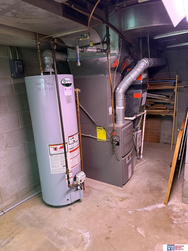 utility room featuring water heater