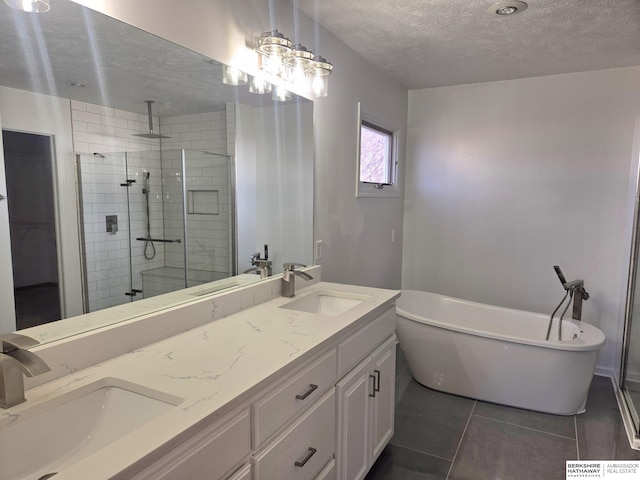 bathroom featuring tile patterned flooring, vanity, and independent shower and bath