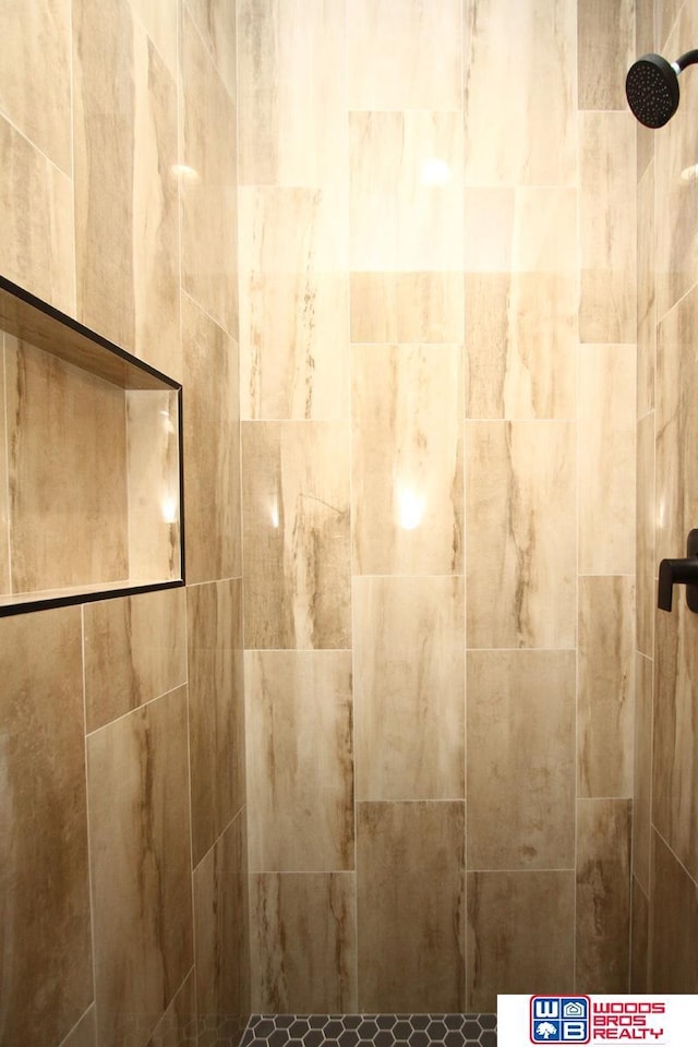 details with a tile shower