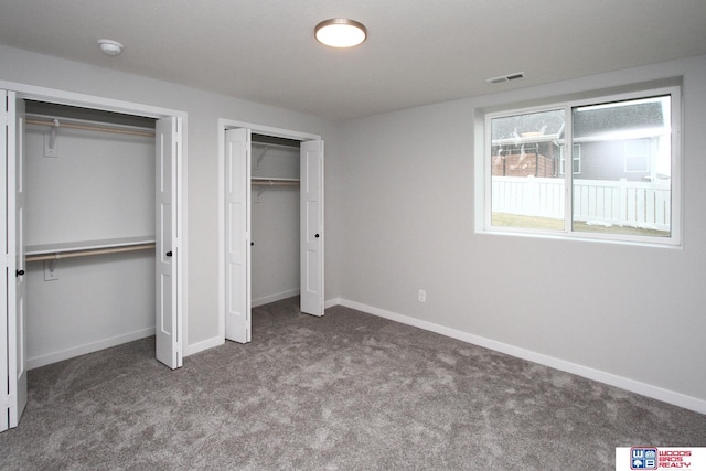 unfurnished bedroom with carpet floors