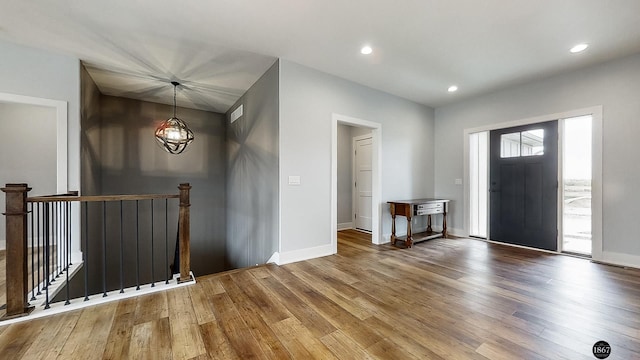 entrance foyer featuring hardwood / wood-style floors