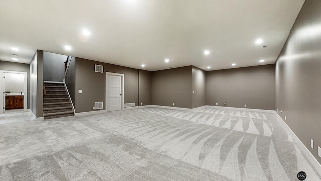 basement with light carpet