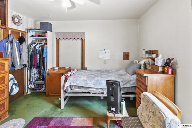 carpeted bedroom with ceiling fan