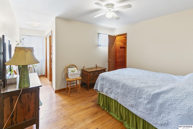 bedroom featuring wood-type flooring and ceiling fan