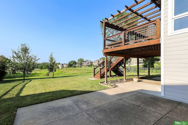 view of patio featuring a pergola and a deck